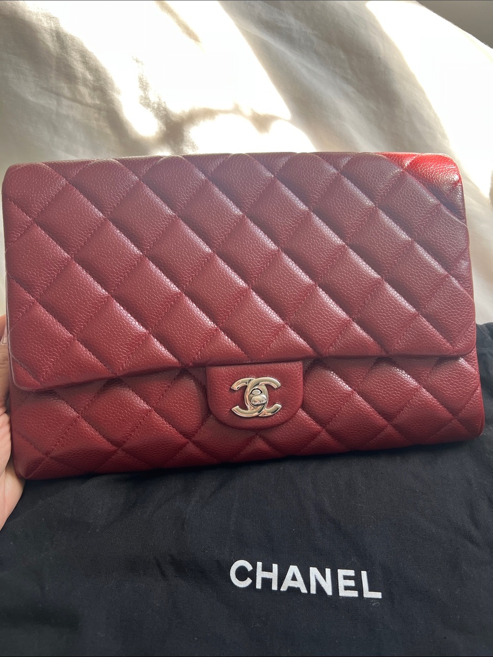 CHANEL Quilted Leather Clutch in Deep Burgundy